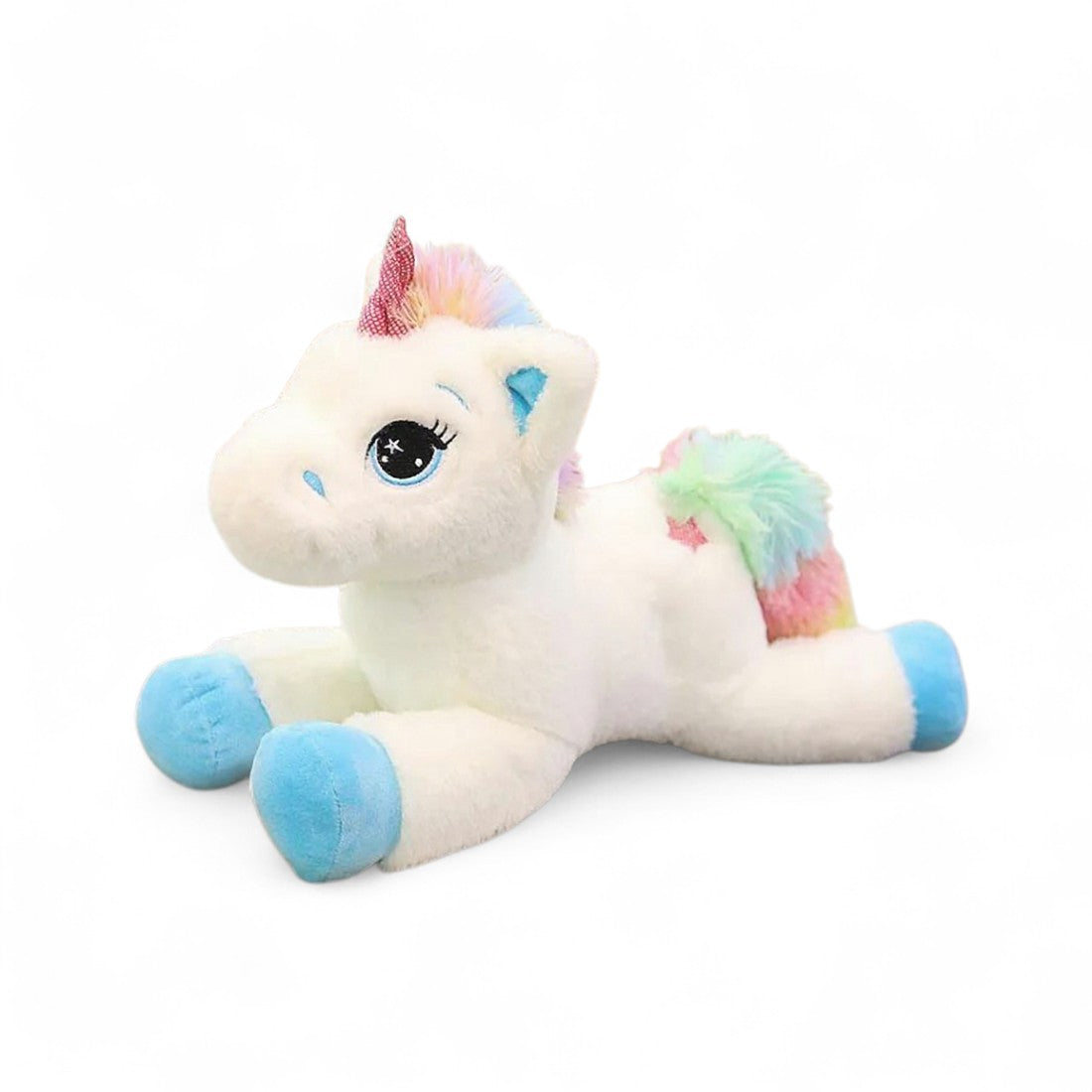 Peluche unicorno arcobaleno disteso con criniera multicolore e zoccoli colorati, su sfondo bianco.