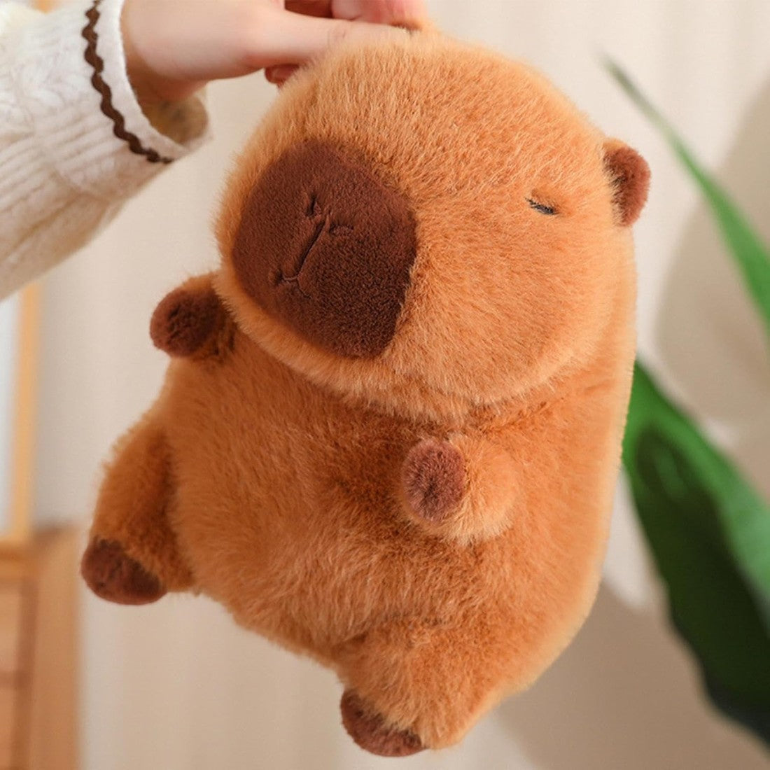 Peluche Capybara con cappellino e sacchetto verdura