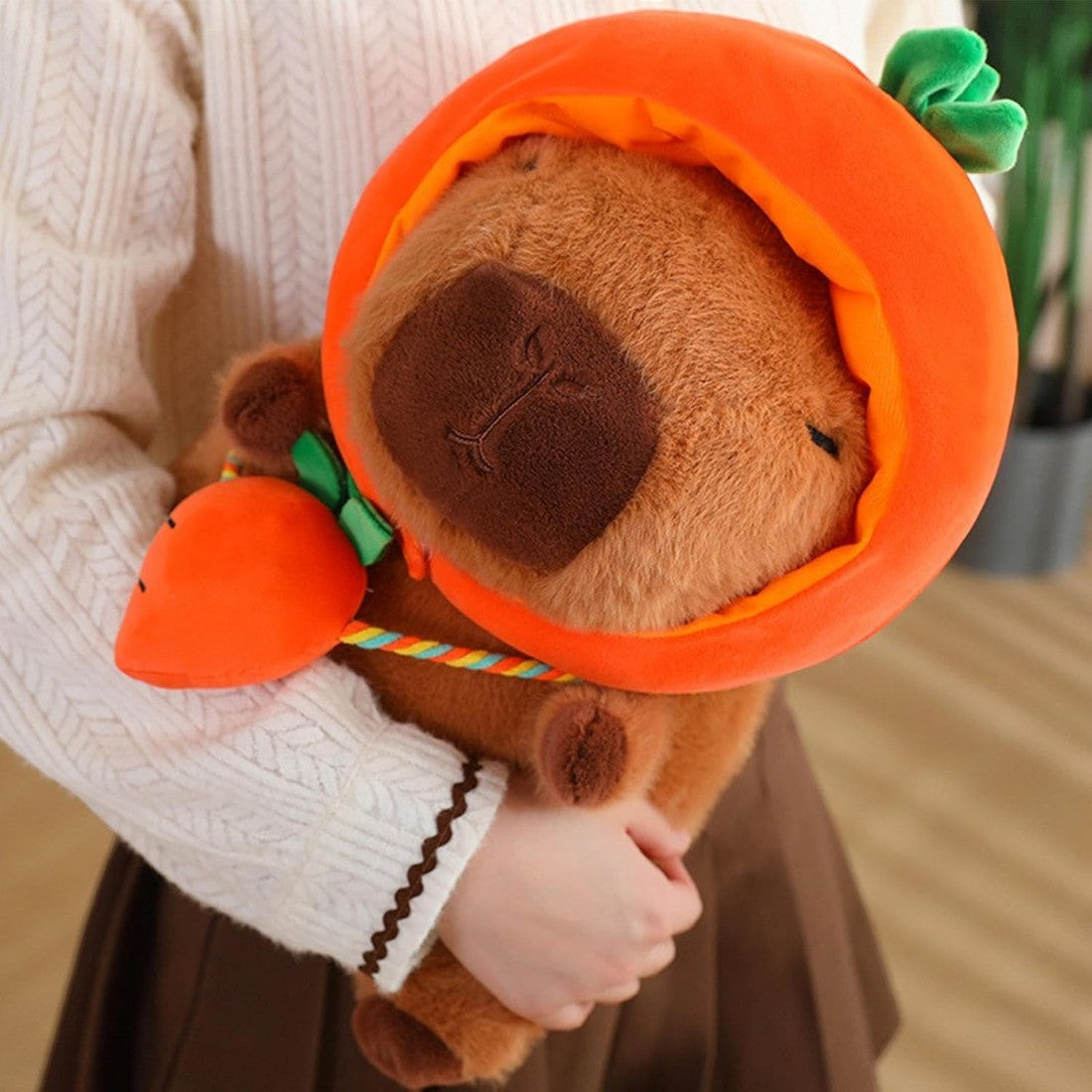 Peluche Capybara con cappellino e sacchetto verdura