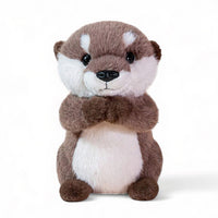 Peluche lontra marrone e bianca in cotone, morbida e sorridente, seduta su sfondo bianco.