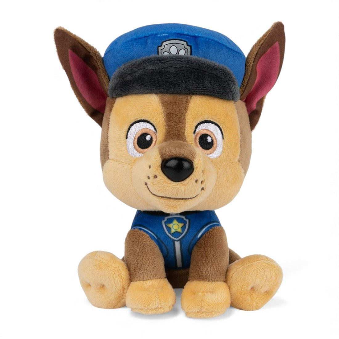 Peluche Chase marrone e beige della Paw Patrol, in divisa blu, orecchie dritte, berrettino blu, seduta su sfondo bianco.