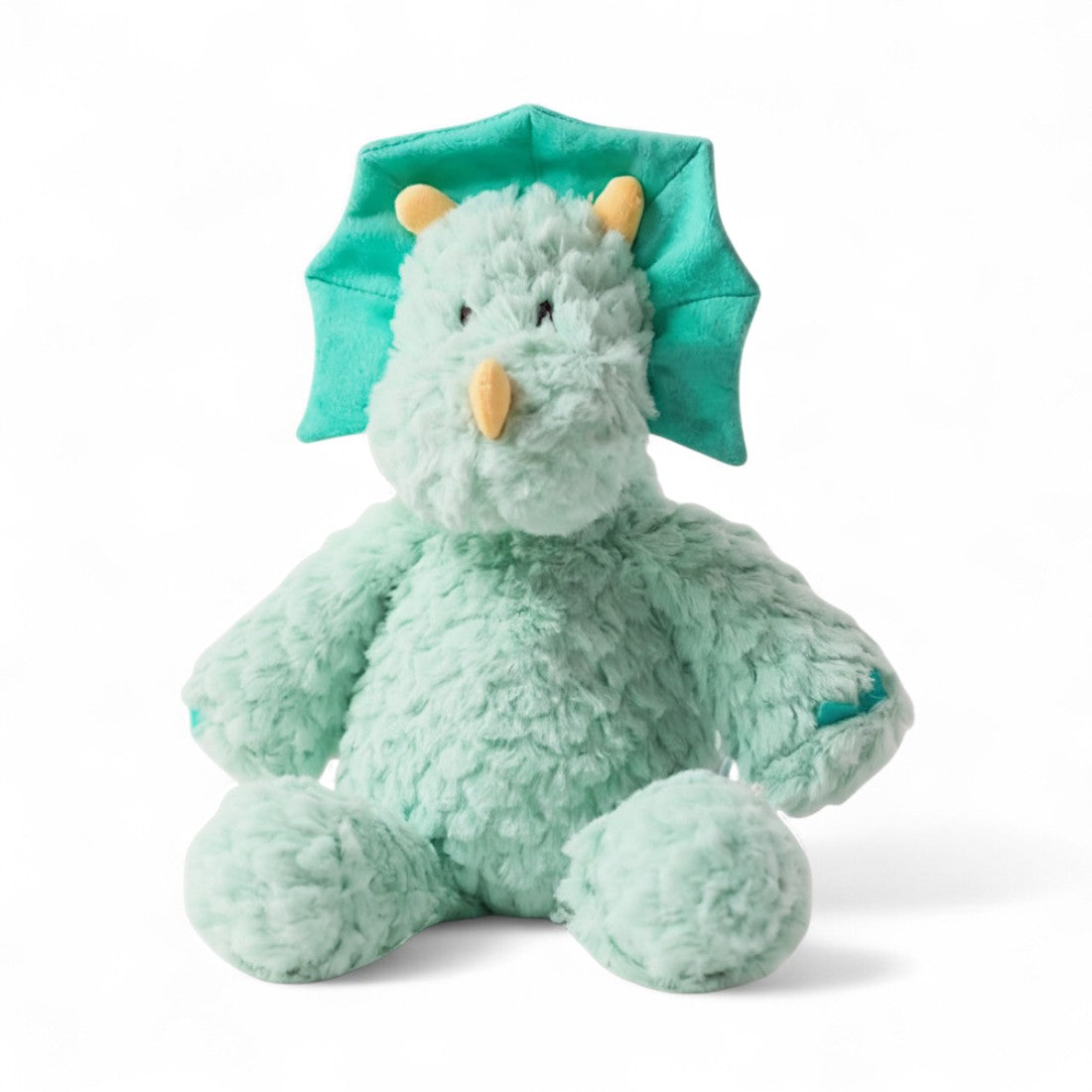 Peluche triceratopo blu cielo, musetto rotondo, tre corna arancioni, gorgiera morbida turchese, texture morbida a squame, occhi ricamati; su sfondo bianco