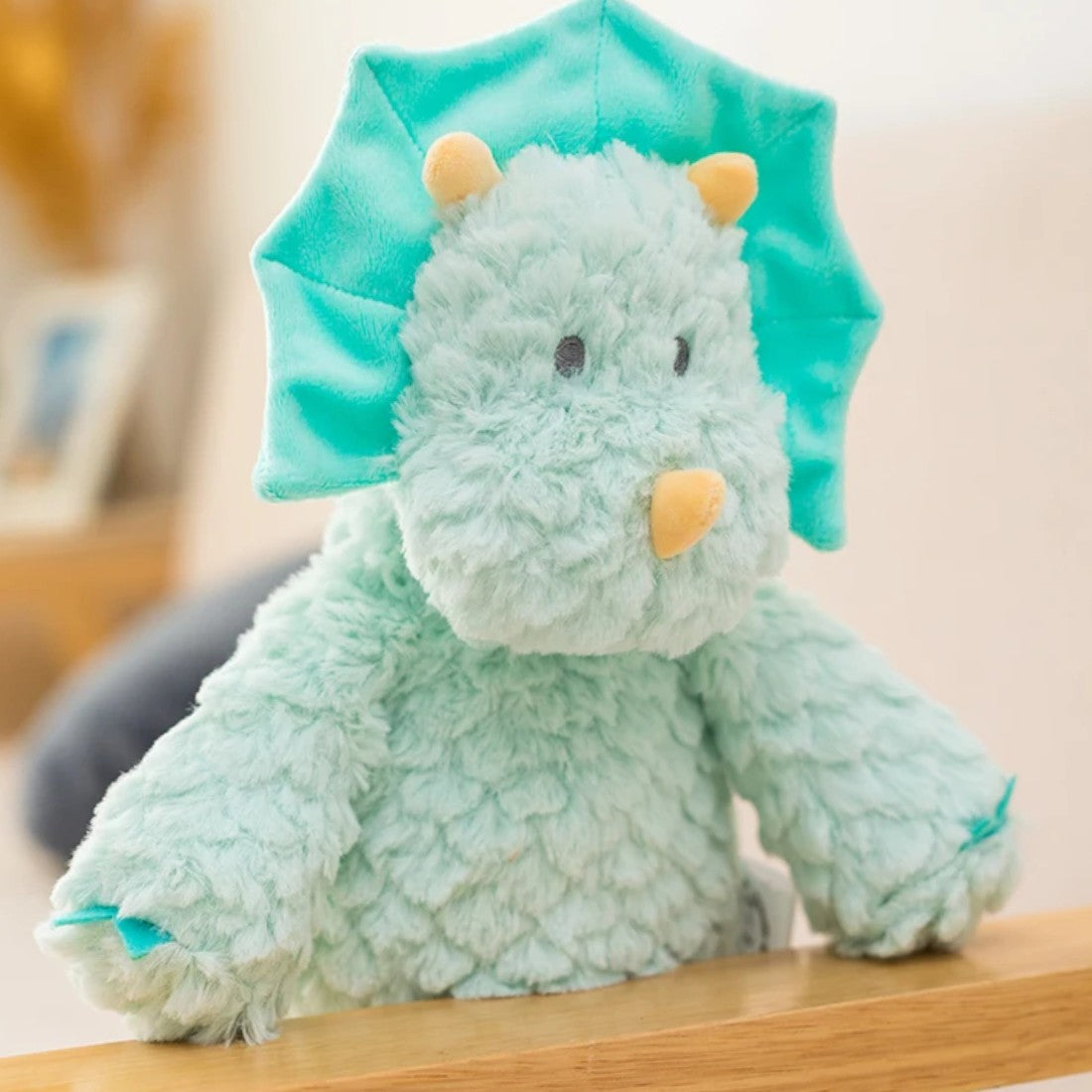 Peluche triceratopo blu carino