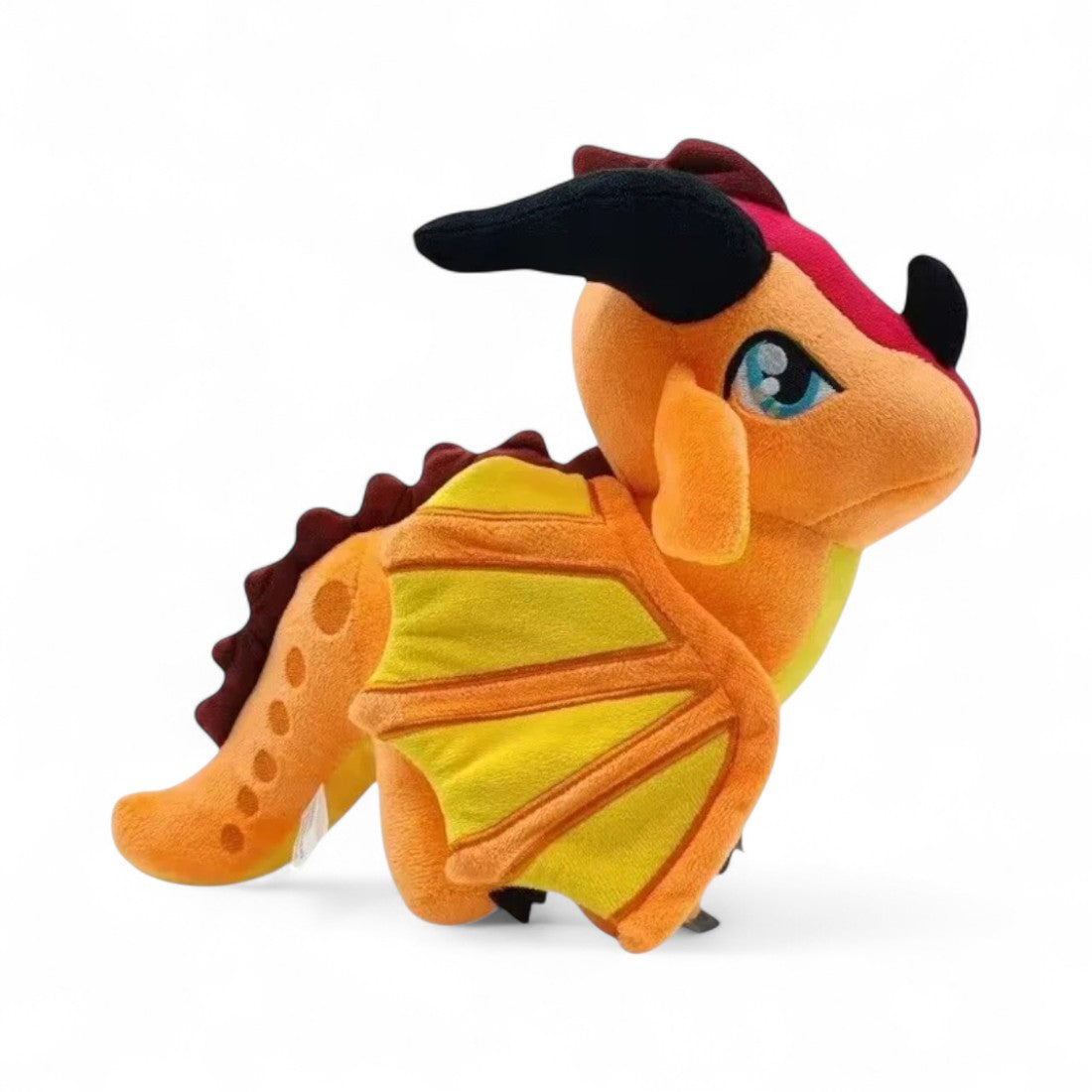 Peluche drago fatato arancione fiammeggiante