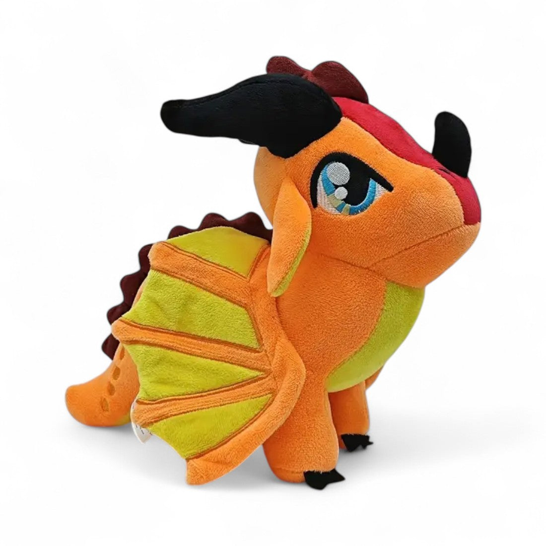 Peluche drago fatato arancione fiammeggiante