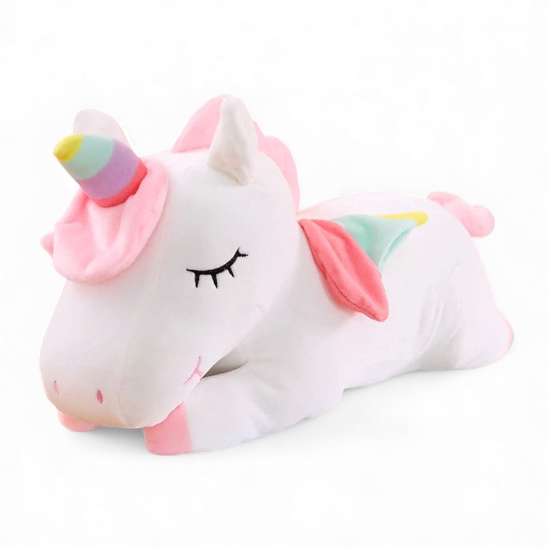 Unicorno di peluche sdraiato per bambini