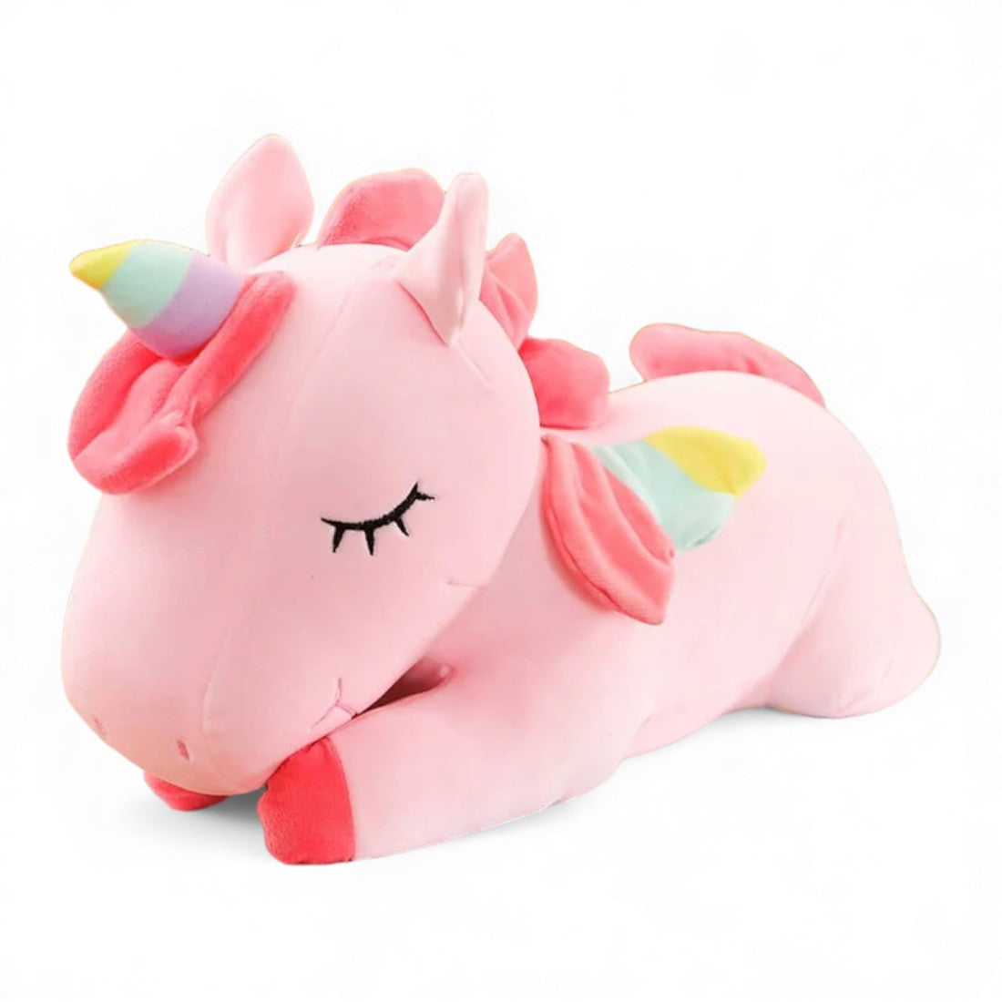 Unicorno di peluche sdraiato per bambini