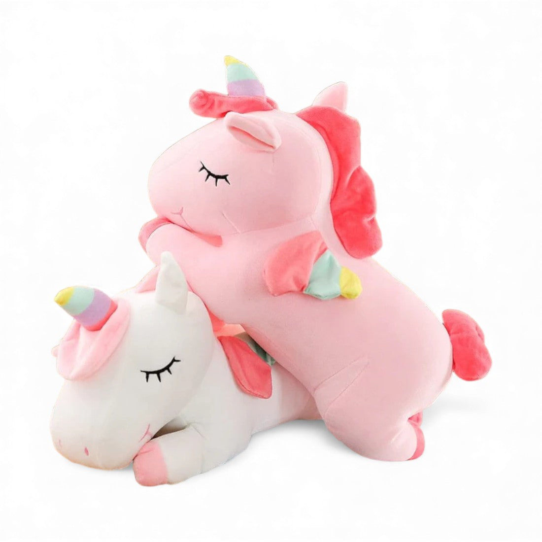 Unicorno di peluche sdraiato per bambini