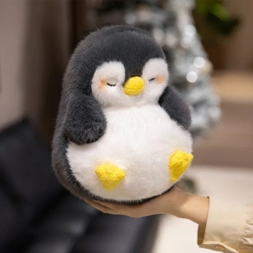 Peluche pinguino morbido addormentato