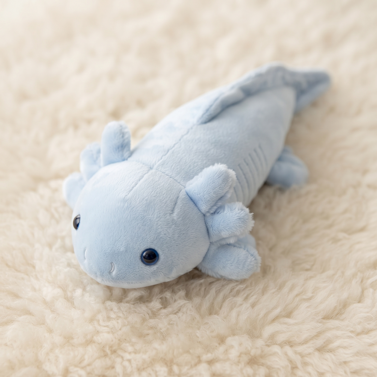 Cuscino di peluche axolotl blu formato allungato - Dettaglio del materiale