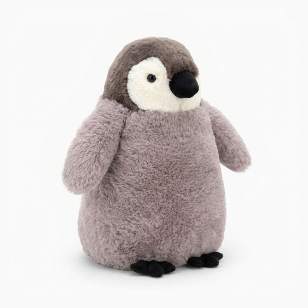 Kuscheliger Pinguin als Schlafkissen - Sfondo bianco di profilo