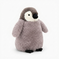 Kuscheliger Pinguin als Schlafkissen - Sfondo bianco di profilo