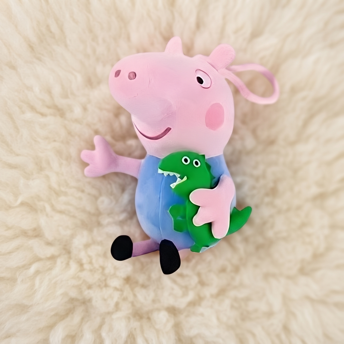 Peluche George Peppa Pig con Dinosauro 19 cm - Dettaglio materiale