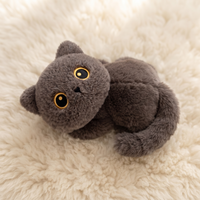 Peluche gatto nero disteso con grandi occhi - Dettaglio del materiale